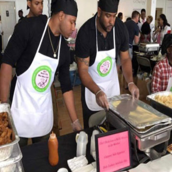 Chefs from Kingdom Café making sure that everything is “just right” for their food presentation