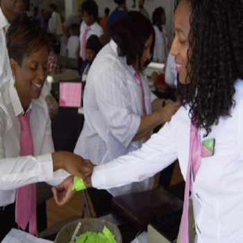 The ladies of Upsilon Omega preparing for the grand event.